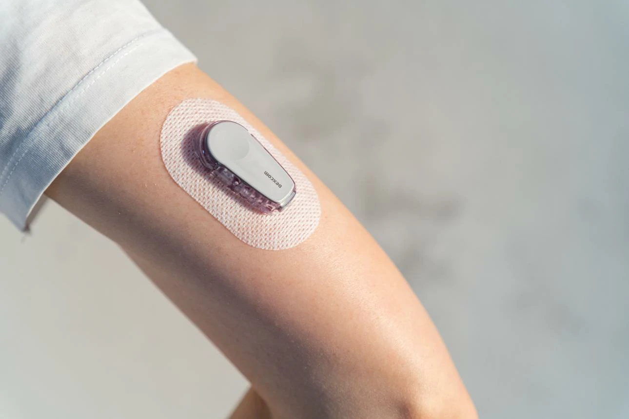 Wearable ECG Sensor Adhesive Base Plate and Electrode Carrier Housing
